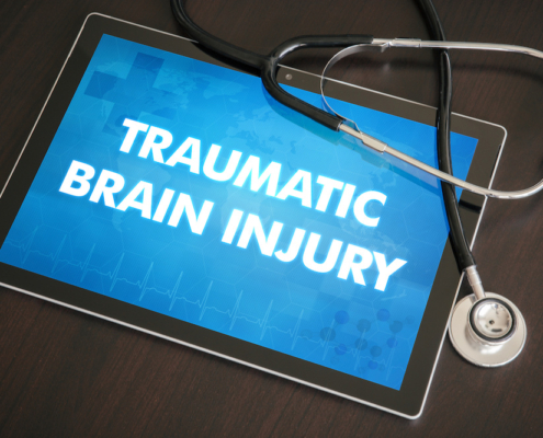 Tablet with brain injury graphic