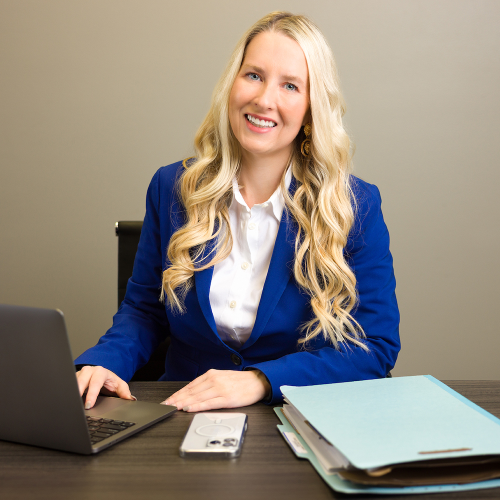 julie-reasonover-attorney-at-desk