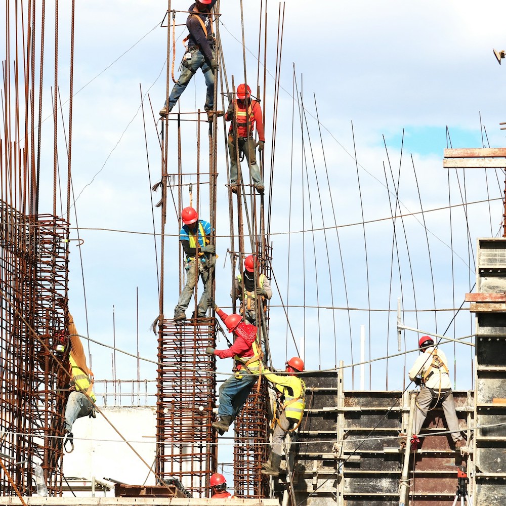 page-construction-site-common-injuries Construction workers on site